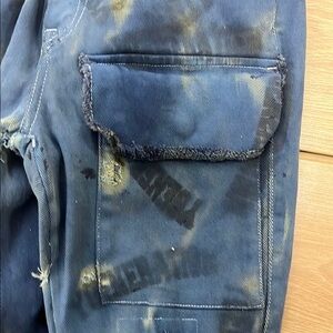 Si it veux Billy Stack Jeans with Distressed Fading and Unique Patch